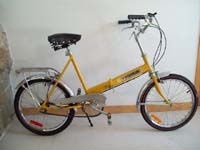 vintage folding bikes were always sold fully loaded
